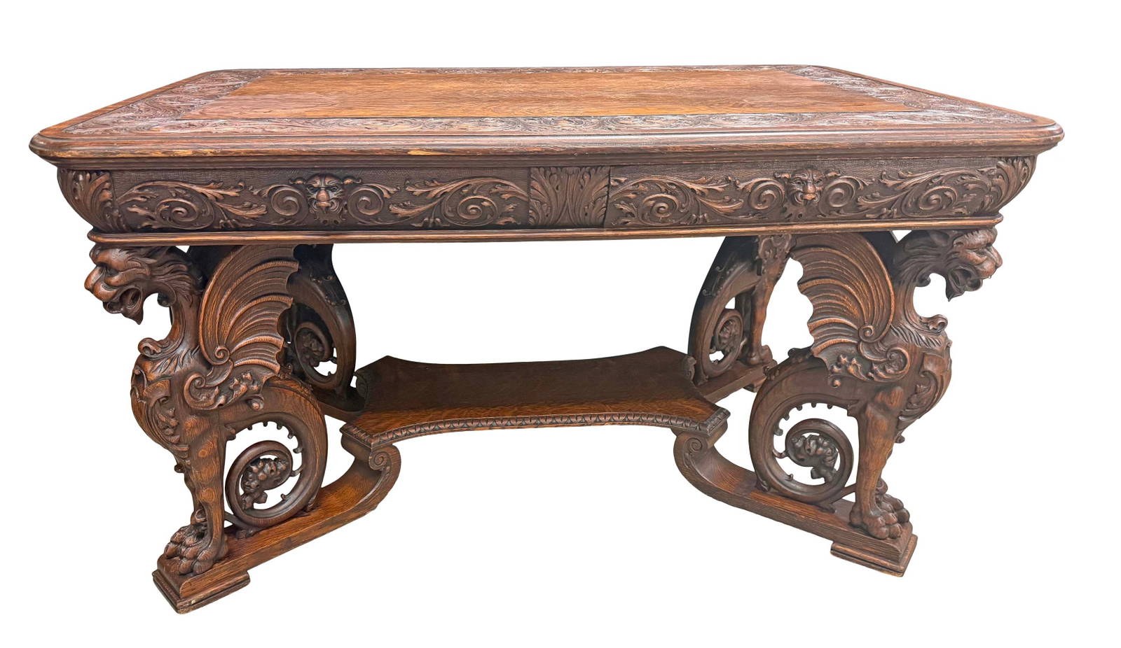Oak library desk attributed to R. J. Horner with full-standing winged griffins